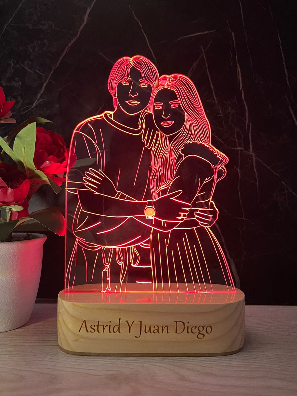 Lámpara led base en madera luz multicolor